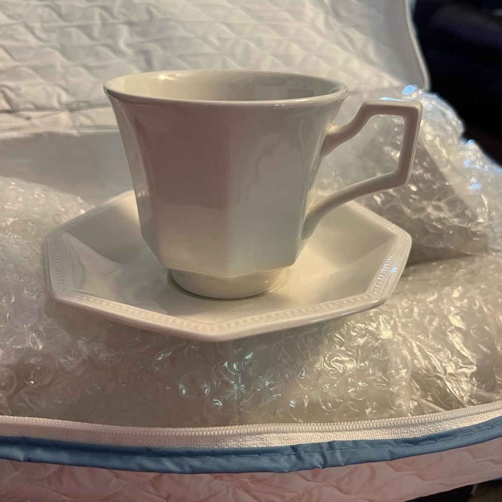Footed cup and saucer set